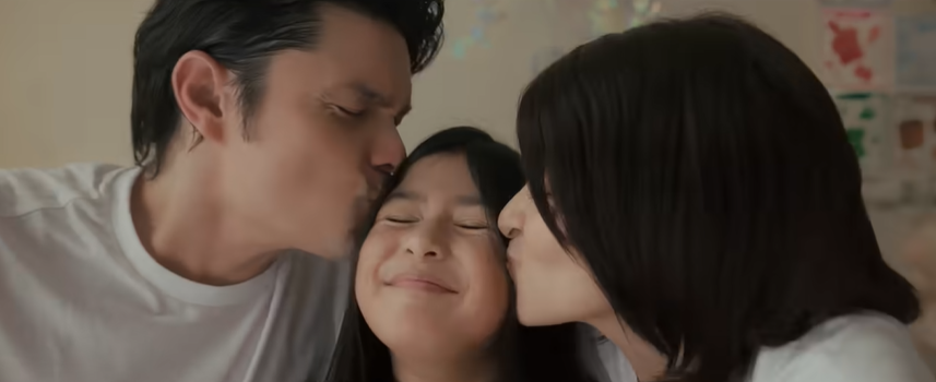 Dingdong Dantes, Zia Grace and Marian Rivera in a scene from Remember. Image from ABS-CBN Star Cinema.
