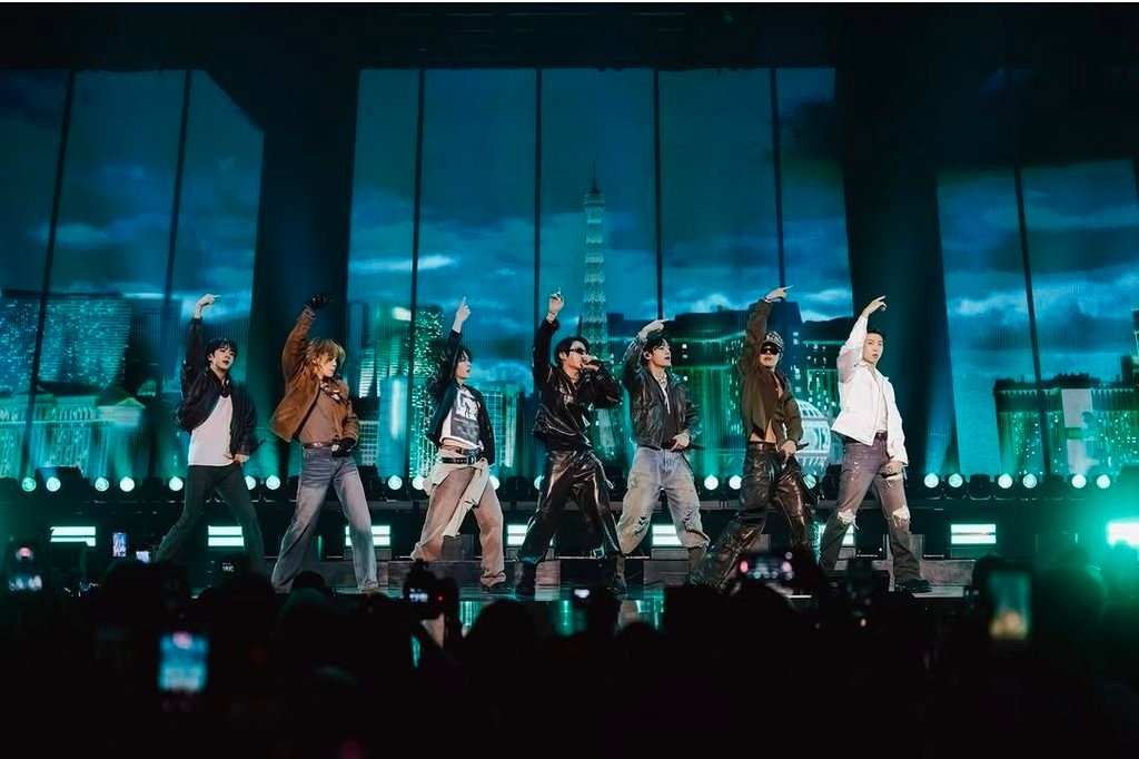 BTS members performing on stage. Image courtesy of BTS Official's Instagram.
